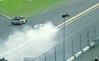 < img src= "Carl Edwards #99 spinning 1.JPG" alt= "2003 NASCAR Craftsman Truck Series, Florida Dodge Dealers 250, at Daytona Speedway" >