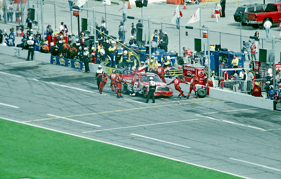 < img src= "Bill Lester #8 pitting 2.JPG" alt= "2003 NASCAR Craftsman Truck Series, Florida Dodge Dealers 250, at Daytona Speedway" >
