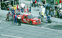 < img src= "Andy Houston #15 pitting.JPG" alt= "2003 NASCAR Craftsman Truck Series, Florida Dodge Dealers 250, at Daytona Speedway" >