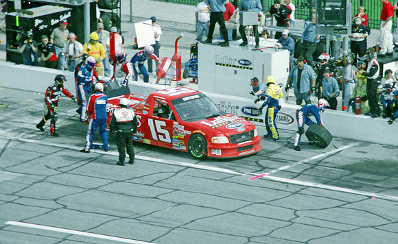 < img src= "Andy Houston #15 pitting.JPG" alt= "2003 NASCAR Craftsman Truck Series, Florida Dodge Dealers 250, at Daytona Speedway" >