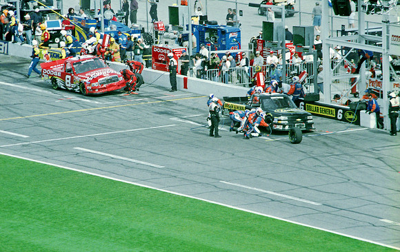 < img src= "Ed Berrier #6 & Bill Lester #8 pitting.JPG" alt= "2003 NASCAR Craftsman Truck Series, Florida Dodge Dealers 250, at Daytona Speedway" >